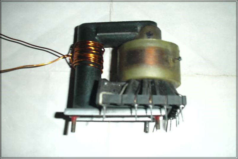 Commercial fly back transformer used in the experiment (Fig.13). Left coil (12 turns) served for simulation of the electron current Ielectron whereas the right one (400 turns) served for simulation of the phonon current Iphonon.