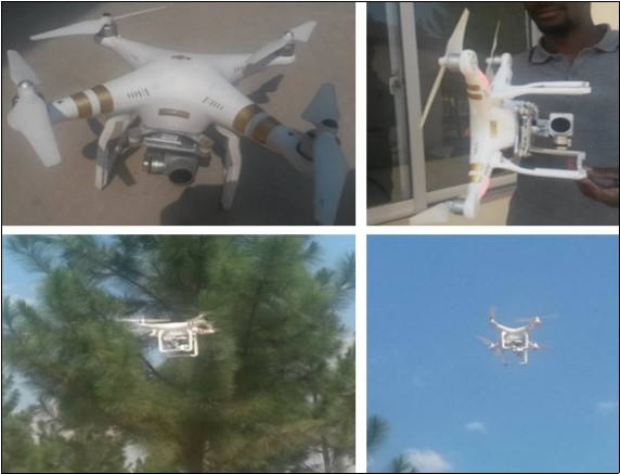 An aero-drone fitted with camera taking photos of mounds in flight mode at the site.